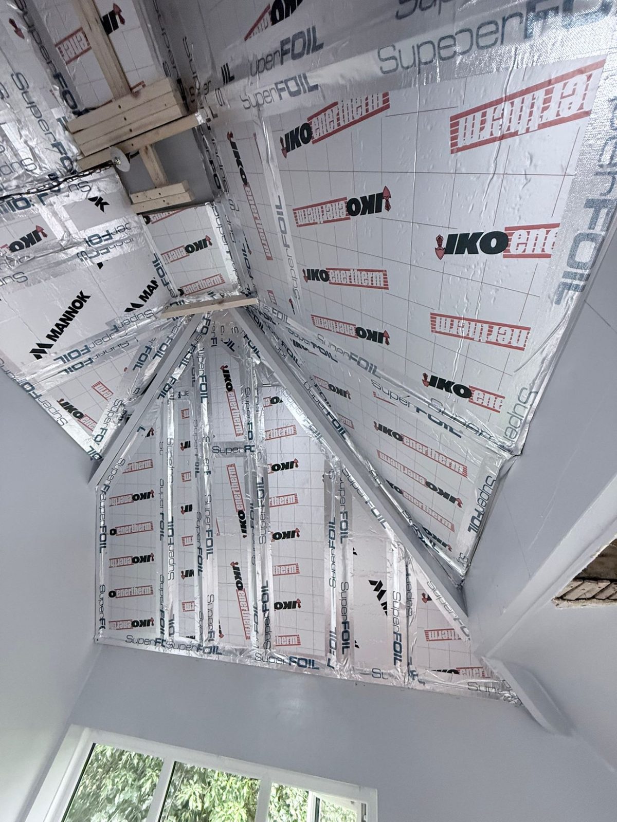 Tall pitched roof fully insulated with JIKO Enertherm PIR and SuperFOIL, every seam foil-taped, Far Headingley LS16