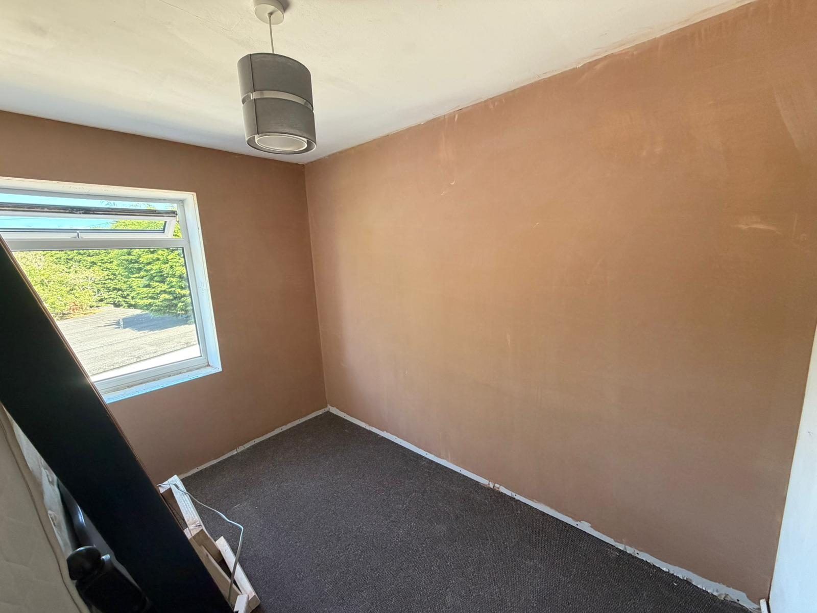 Completed plastered bedroom with IWI hidden behind smooth finish, Roundhay LS17