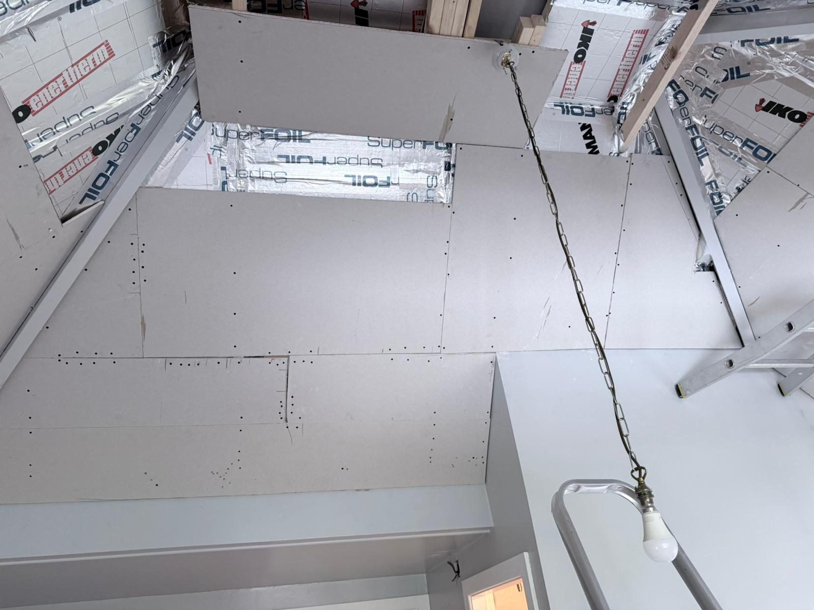 Plasterboard ceiling progressing across vaulted IWI build-up in Far Headingley LS16 garage extension