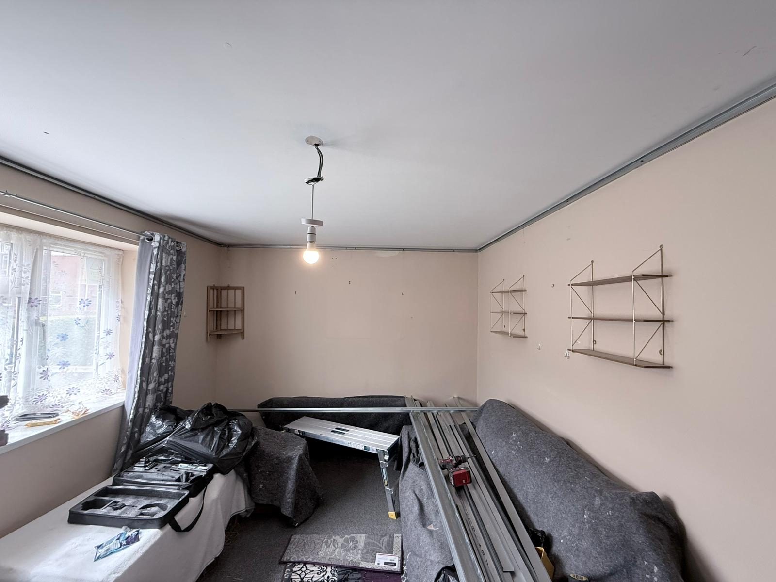 Existing ceiling in Morley LS27 lounge before suspended acoustic ceiling install