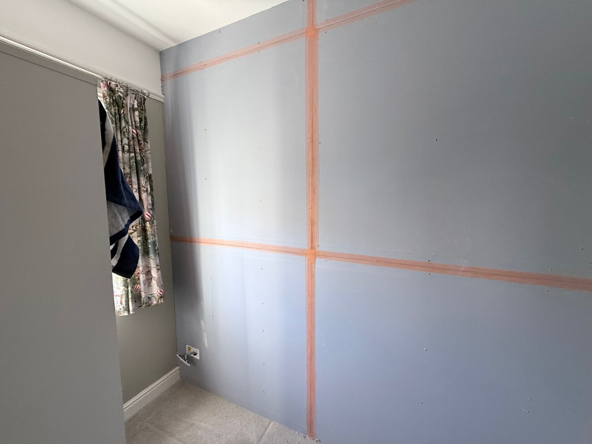 Soundproof boarding with taped joints across full office wall — Roundhay LS17