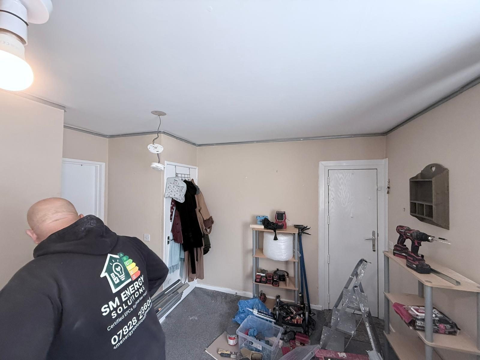 Finished plastered suspended acoustic ceiling in Morley LS27